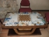 "Table de jeu" (Ebénisterie Adrian Rhoney)   8 x 5 carreaux de 15 cm x 15 cm